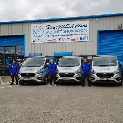 Stairlift Solutions team and vans at the mobility showroom, County Tyrone
